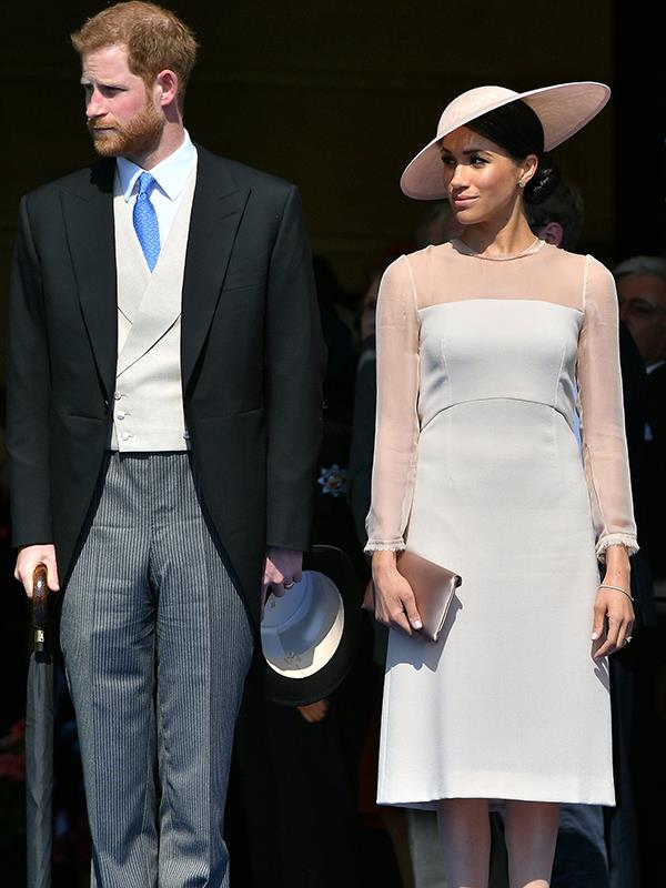 Despite taking a departure from her usual style, Meghan looked demure and absolutely gorgeous.