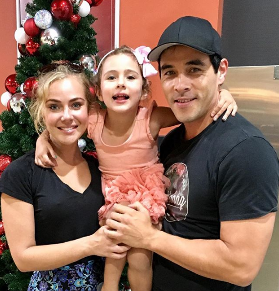 James wished his fans a Merry Christmas with this sweet family photo.