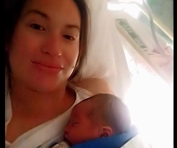 The 31-year-old describes motherhood as "beautiful."