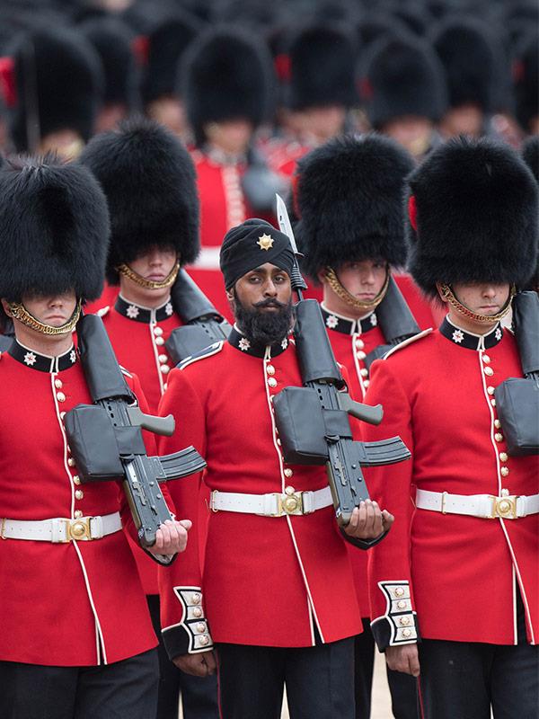 22-year-old soldier Charanpreet Singh Lall is the first person to wear a turban during the official trooping parade.
