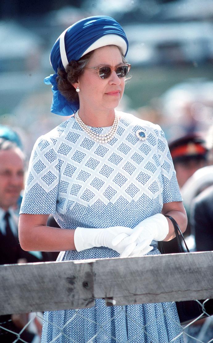 A trip to New Zealand wouldn't be complete for the Queen without a fabulous pair of frames teamed with a turban-style headdress.