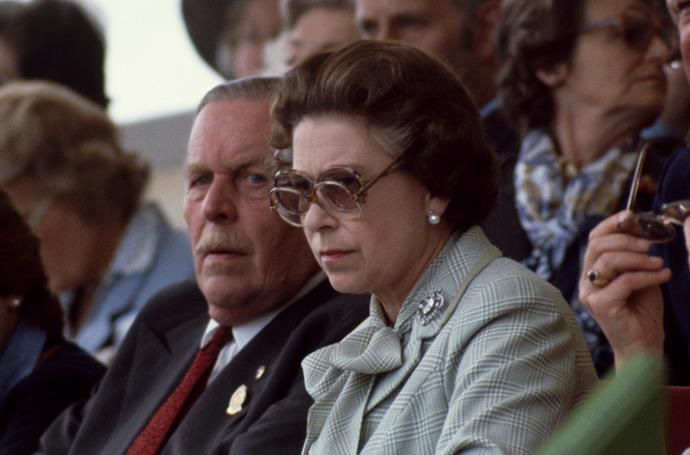 Double-trouble! The Queen was repping stylish, yet practical eyewear since before the time of bifocals. Here, the Queen wears a pair of glasses over her sunglasses in the Royal Box at the Windsor Horse Show in 1982.