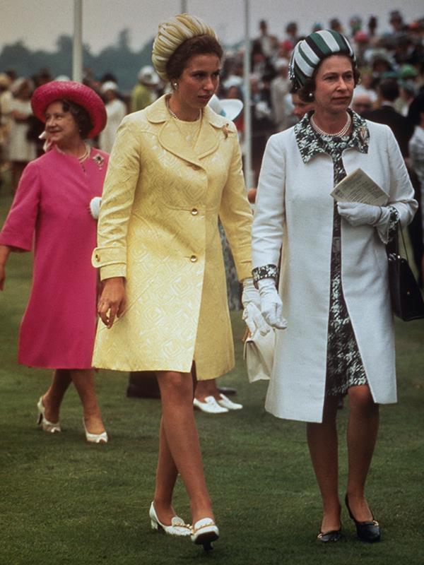 Queen Elizabeth with Princess Anne and the Queen Mother in pink at Royal Ascot, 1970.