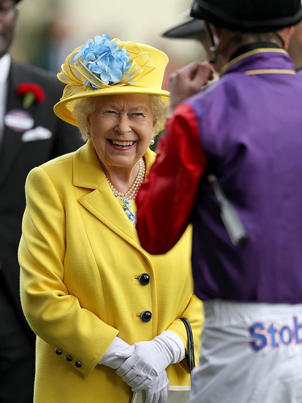 The Queen has a laugh with one of the jockeys at Royal Ascot 2018.