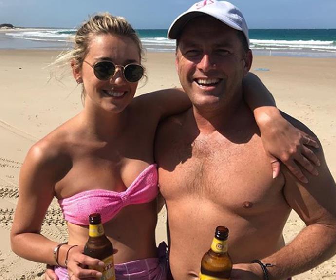 The couple's low-key Valentine's Day - beers on the beach.