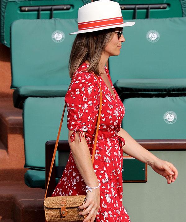 That's ace! In May, the tennis fan sat front and centre at Wimbledon and this red Ralph Lauren wrap dress perfectly showcased her burgeoning belly.
