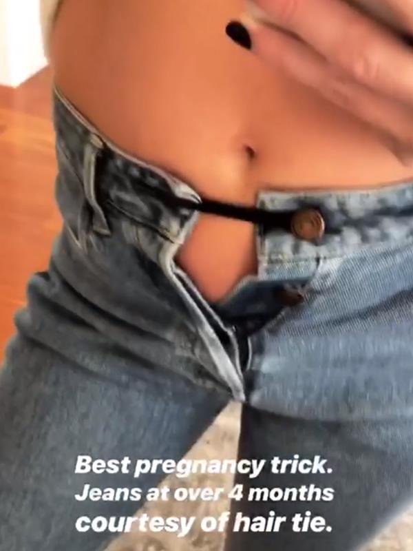And the hair tie holding her pre-pregnancy jeans up. Genius!