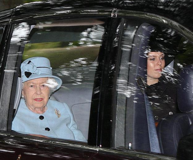 Her Majesty and Princess Beatrice make their way to the Sunday church service.