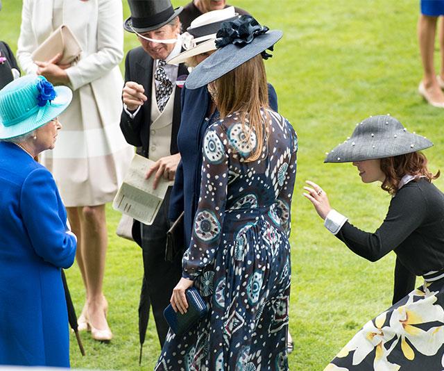 Hello, granny! Princess Eugenie spices up her curtsy with a wave.