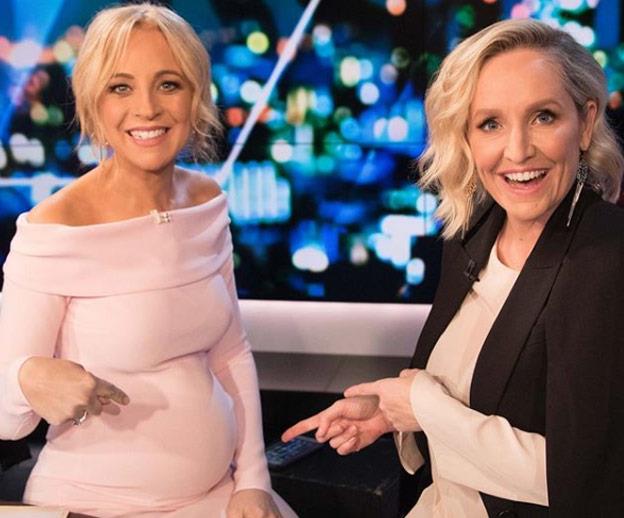 Carrie's [first bump social media snap](https://www.nowtolove.com.au/parenting/celebrity-families/carrie-bickmore-baby-bump-49487|target="_blank") featured friend of *The Project* Fifi Box and the pregnant presenter in a soft-pink off-the-shoulder dress by Bec & Bridge.