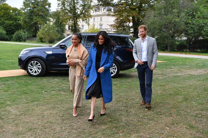 Duchess Meghan and her mum Doria Ragland arrive at the cookbook launch with Prince Harry.