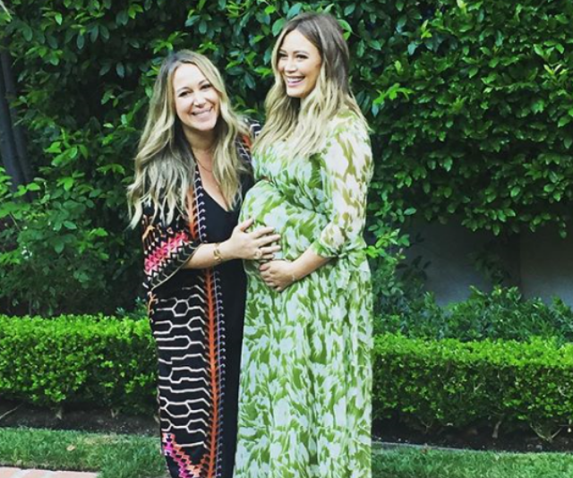 [Hilary Duff](https://www.nowtolove.com.au/parenting/family/hilary-duff-slammed-for-kissing-her-four-year-old-son-on-the-lips-32918|target="_blank") will have a daughter very soon, so she took to her Instagram account to share that joy, writing, "Don't know how I missed #nationaldaughterday but here I am with my beautiful sissy and my little thumping daughter still cooking. I feel so blessed to have my son and now to have the gift of a daughter! I don't know what I possibly did so right! #waitingonyouB"