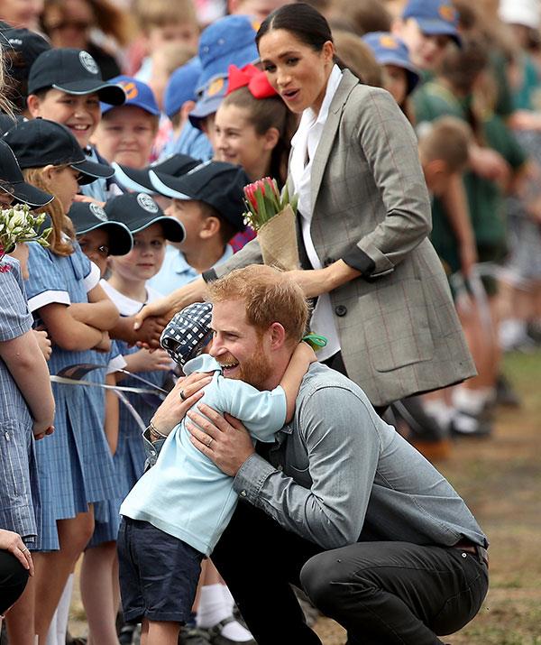 Meghan watched on during the sweet encounter before getting her own bear hug from Luke.