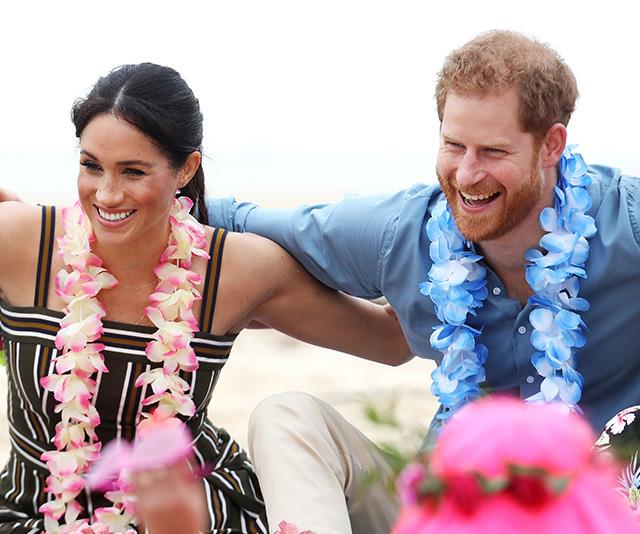 Sitting in an 'Anti Bad Vibe Circle' on the beach, Harry and Meghan shared some sweet interactions with the locals.  *(Image: Getty Images)*
