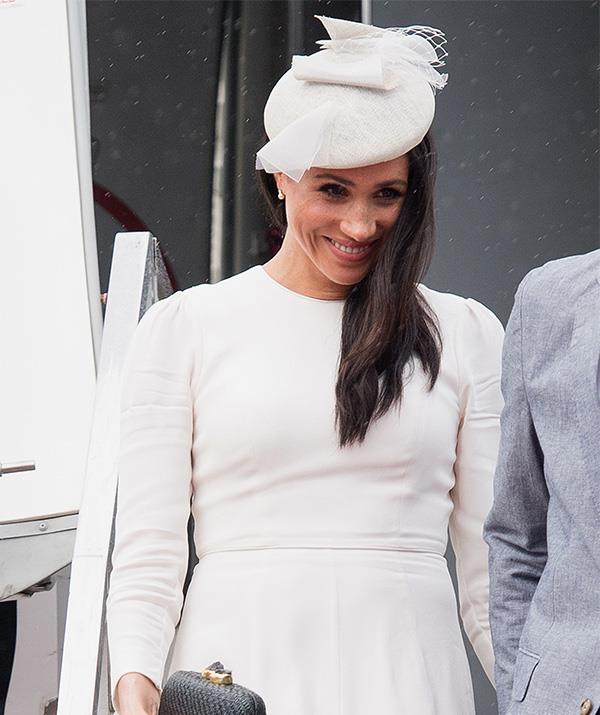 Accessories-wise, the Duchess wore a Stephen Jones hat and earrings that were a gift from Queen Elizabeth herself! *(Image: Getty Images)*