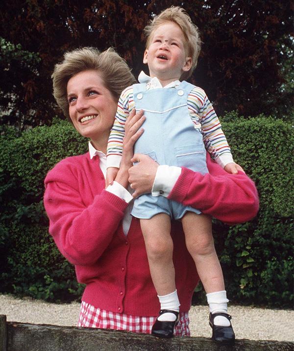 Ever the adventurer, Prince Harry looks to the sky with mum Diana. Harry always loved having his head in the clouds, quite literally - he grew up to become a helicopter pilot!