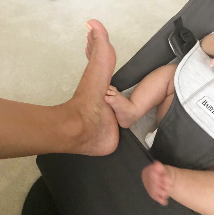 The petite star jokes that baby Santiago's feet are 'almost the same size' as hers already!