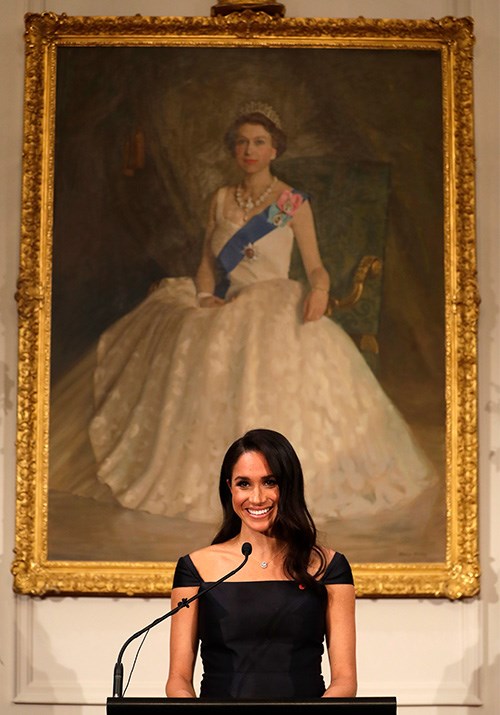 Standing beneath a striking portrait of Queen Elizabeth II, Meghan shared a rousing speech with guests at Government House in Wellington.