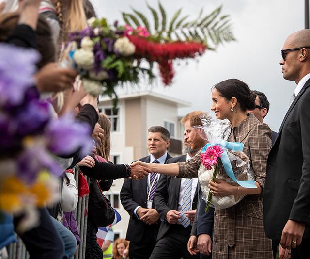 The royal couple were showered in flowers in gifts as they arrived in Wellington. *(Image: Getty)*