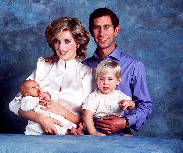 **The early years**: Princess Diana cradles a newborn Prince Harry while Prince Charles holds Prince William back in 1984. *(Image: Rex Features)*