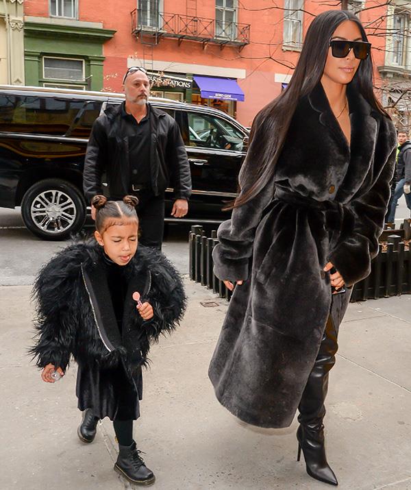 Kim Kardashian and daughter North West don't do things by halves, especially when it comes to their wardrobes. In this case, *black* is the new black for this stylish duo! *(Image: Getty Images)*