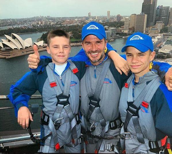 David took Cruz and Romeo to the skies as they climbed the Sydney Harbour Bridge during the Invictus Games. *(*(Source: Instagram @davidbeckham)*