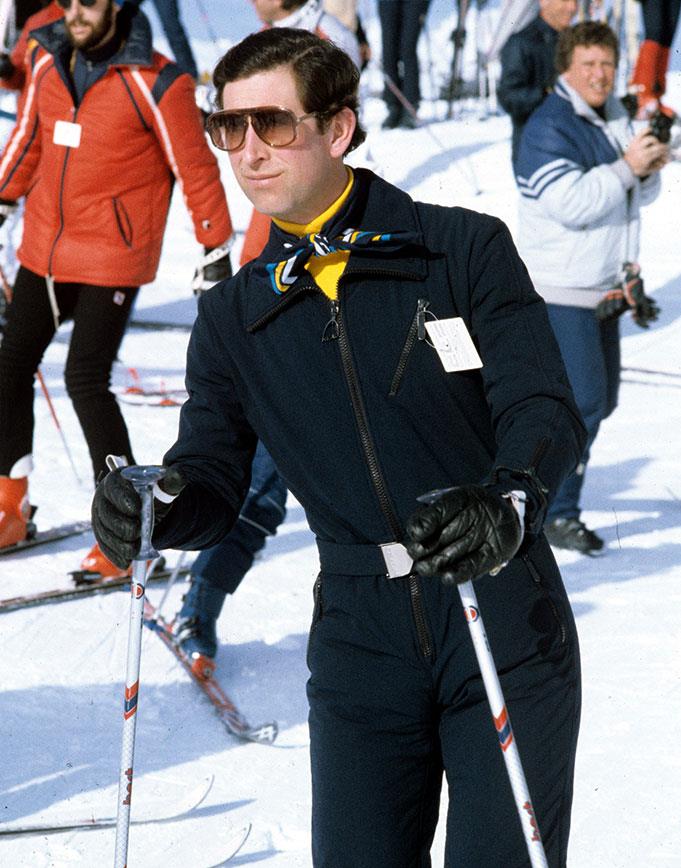 Prince Charles serves some serious style lessons on the slopes in Liechtenstein in 1983. Bonus points for the yellow turtle-neck and snazzy neckerchief. *(Image: Steve Wood/REX/Shutterstock)*