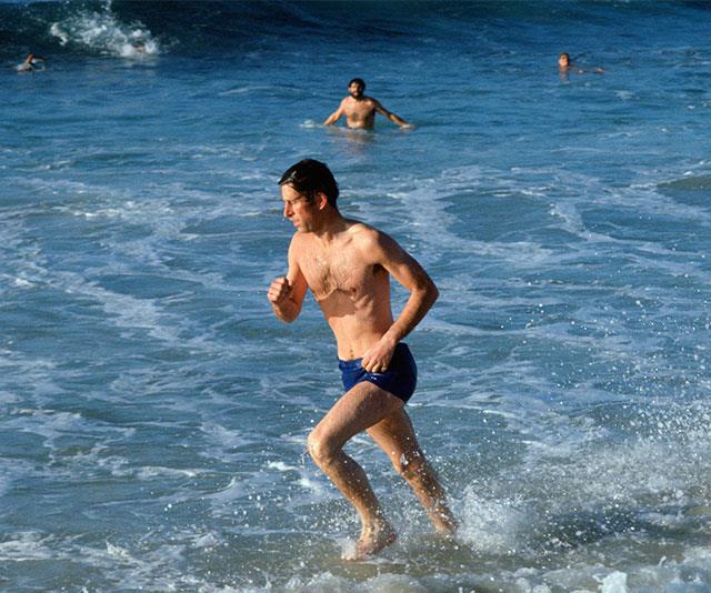 Charles Down Under! The prince takes in a swim at Bondi Beach during an official tour of Australia in 1981. *(Image: Getty)*