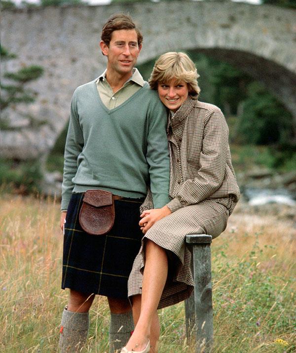 With all the hope in the world under their wings, Prince Charles and Princess Diana bask in their newlywed glow on honeymoon in Balmoral, Scotland in 1981. *(Image: Getty)*
