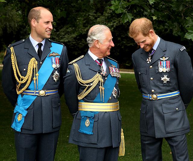 The royal lads share a candid moment between takes. *(Image: Getty - Images are part of a set to mark His Royal Highness's 70th birthday.)*