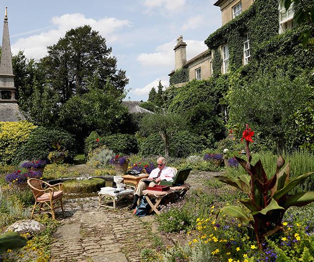 Now that's a garden! The birthday boy looks peaceful in his favourite habitat. *(Image: Getty - Images are part of a set to mark His Royal Highness's 70th birthday.)*