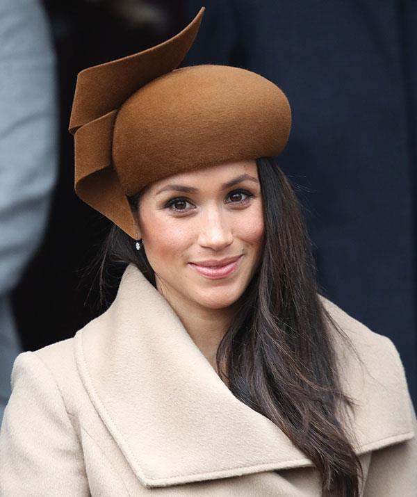 For her first Christmas with the Royal Family in 2017, Meghan opted for a camel-coloured coat by Sentaler and a chestnut-brown felt Philip Treacy hat with an intricate twirl at the top.