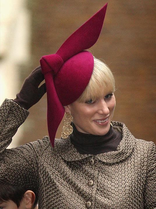 In 2008, Zara was all wrapped up like a present in this red hat with a statement bow.