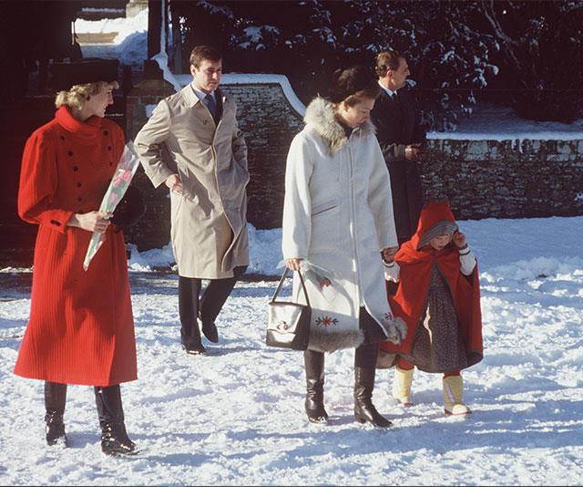 Snowed under! Princess Diana, Prince Andrew, Princess Anne and a young Zara Phillips navigate their way through the powder in 1985.