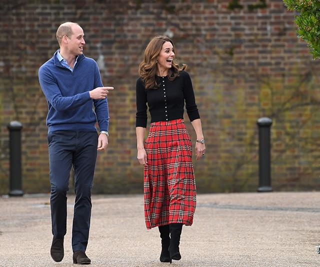A Merry Christmas indeed! The royal pair were all smiles as they entered the festive event. *(Image: Getty)*
