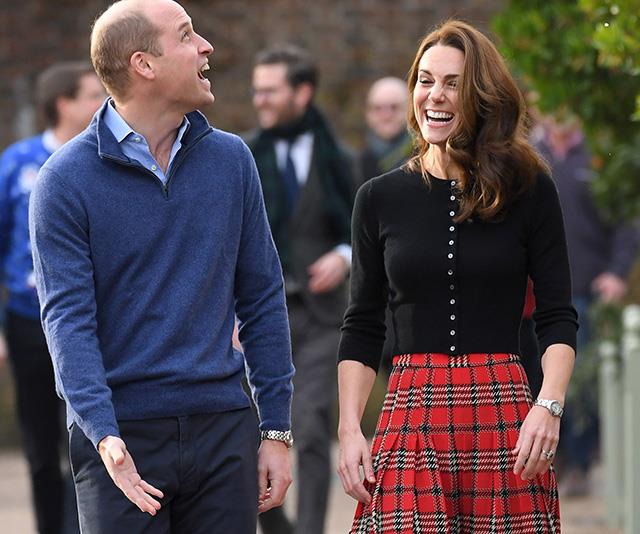 Kate looked stunning in a tartan skirt while Wills opted for a blue jumper and shirt. *(Image: Getty)*