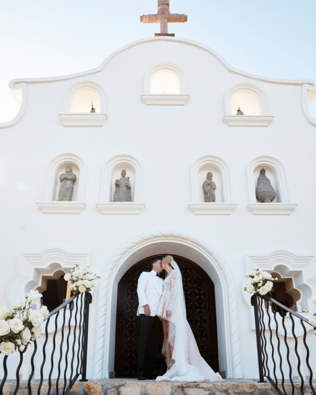 Karl and Jasmine kiss at the One&Only chapel in Cabo, Mexico. *(Source: Supplied)*