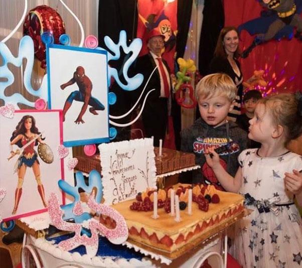 Spider-Man and Wonder Woman posters were adorned on the palace walls for the twins. *(Image: @hshprincesscharlene Instagram)*