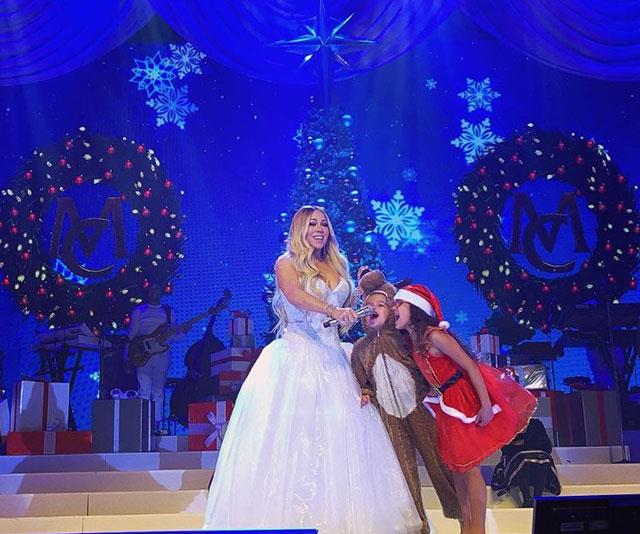 She's the unofficial Queen of Christmas and this year, Mariah Carey is getting some help from her own cute elves, twins Morocco and Monroe, both six. *(Image: @mariahcarey Instagram)*