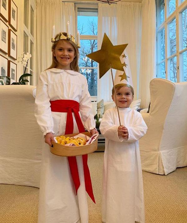 Princess Victoria of Sweden's two children, Princess Estelle, six, and Prince Oscar, two, make for the sweetest Christmas nativity angels. *(Image: @kungahuset Instagram)*