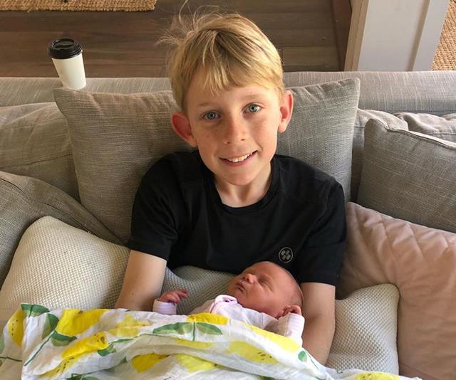 Ollie is already a dab hand at this big brother role.