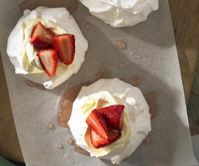 **Mini pavlovas with vanilla syrup strawberries**
<br><br>
You could experiment with a variety of different berry toppings here. Whatever you choose, you just can't beat a pav topped with whipped cream and berries and drenched in syrup.
<br><br>
See the full *Australian Women's Weekly* recipe [here.](https://www.womensweeklyfood.com.au/recipes/mini-pavlovas-with-vanilla-syrup-strawberries-12060|target="_blank")