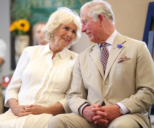 Proving he's a pro at snapping sweet moments between couples, another of Jackson's favourite images of the year was this loving look between Charles and Camilla, who were attending the opening of Strand Hall in Builth Wells, Wales in July. *(Image: Chris Jackson / Getty Images)*