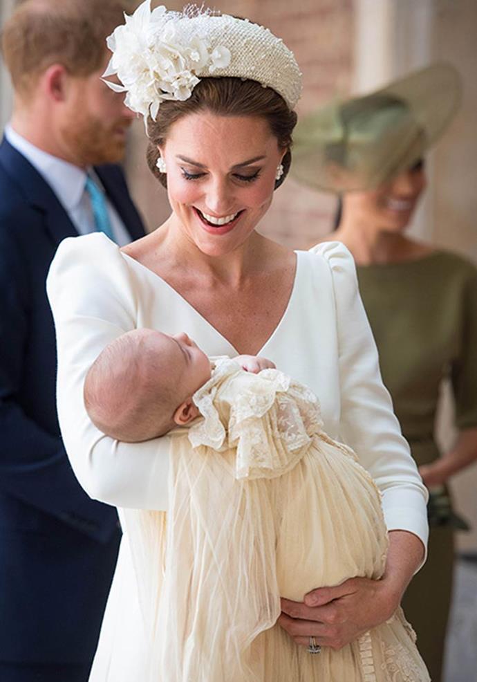 **Pure joy!** Catherine couldn't have looked more in love with her son [at his christening.](https://www.nowtolove.com.au/royals/british-royal-family/prince-louis-baptism-49654|target="_blank") *(Image: Getty)*