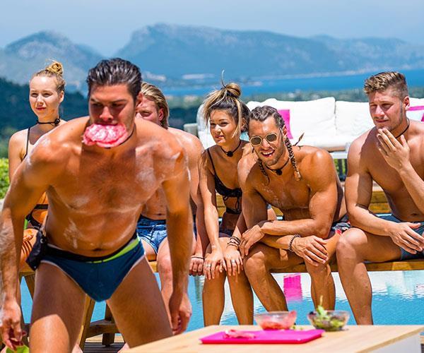 "Yeah, no, like, I'm quite fit... I'm a little bit nervous because I don't want to lose my muscle, I guess," Justin reveals to NW. *(Source: Love Island / ITV)*