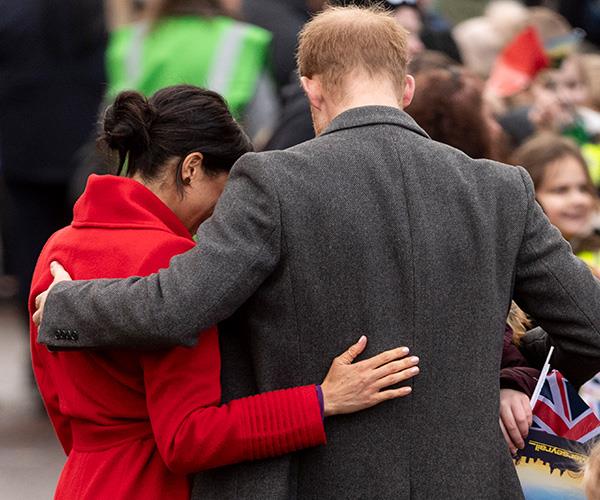 The Duke and Duchess share a tender moment as they greet the crowds. *(Image: Getty Images)*