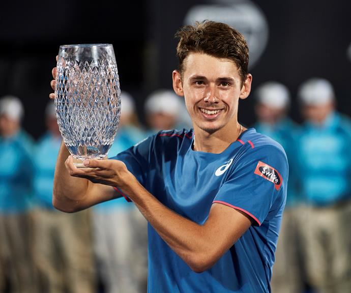 Alex holding his Sydney International winner's trophy. *(Image: Getty)*