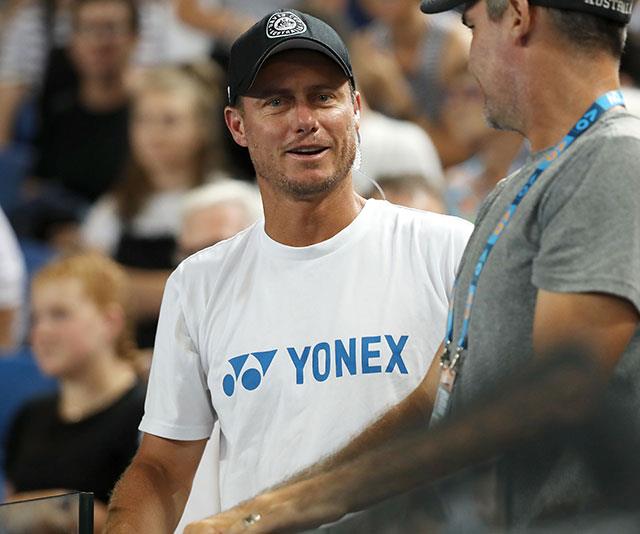 Tennis royalty and commentator [Lleyton Hewitt](https://www.nowtolove.com.au/tags/lleyton-hewitt|target="_blank") watches the second round game between Henri Laaksonen of Switzerland and Alex De Minaur on day three of the Australian Open. (Image: Getty)*
