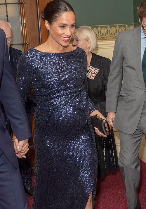 On January 17, Meghan got her glam on as she [attended a charity performance by Cirque de Soleil](https://www.nowtolove.com.au/royals/british-royal-family/meghan-markle-blue-dress-diana-53588|target="_blank") with husband Prince Harry. Her stunning sequined dress was designed by Roland Mouret. *(Image: Getty Images)*