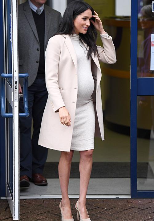 Stepping out in Mayhew in January, the pregnant royal looked a million dollars in this beige ensemble - but to the surprise of everyone, her H&M dress only costs $39! *(Image: Getty Images)*